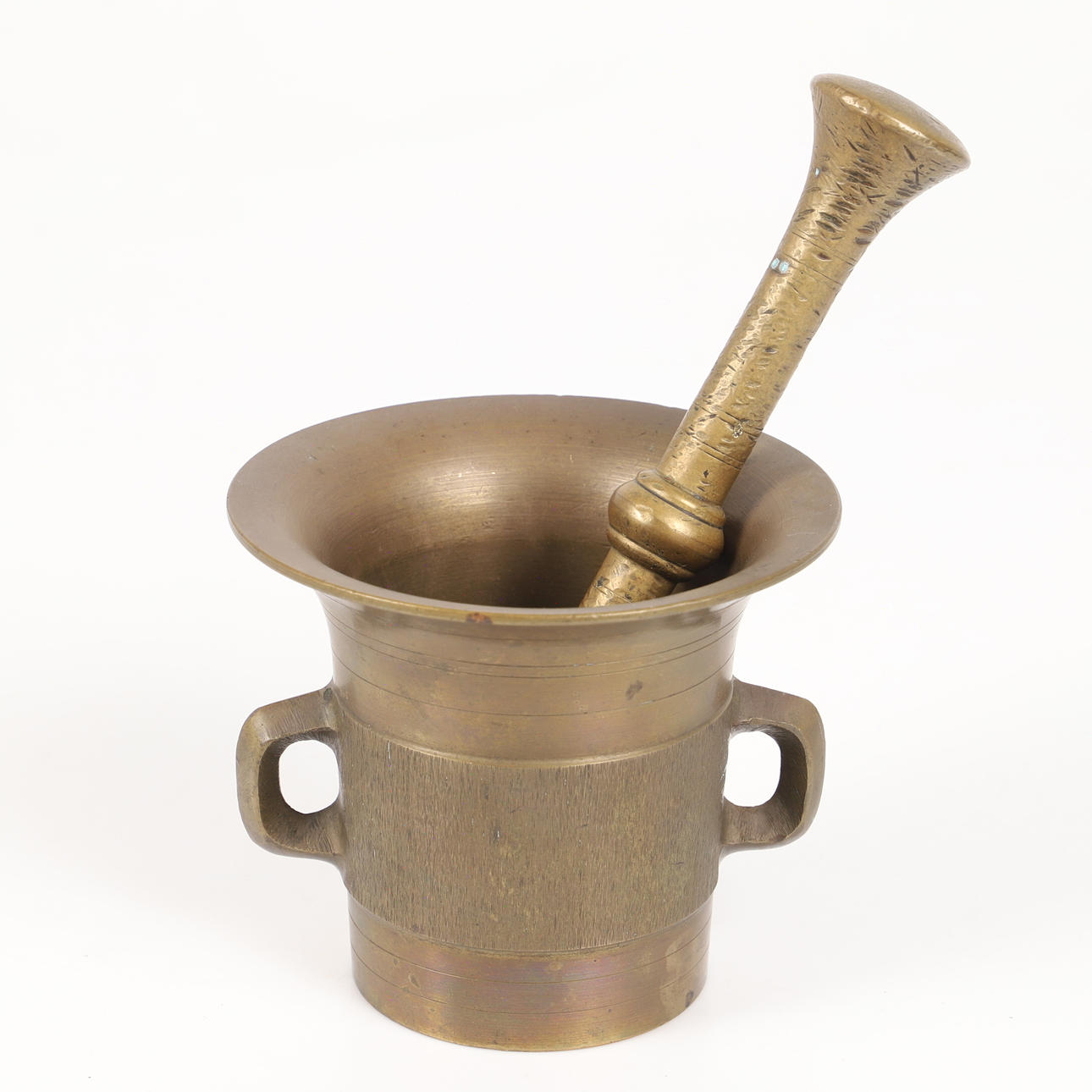 Mørtel, messing med støder, første halvdel af det 20. århundrede.