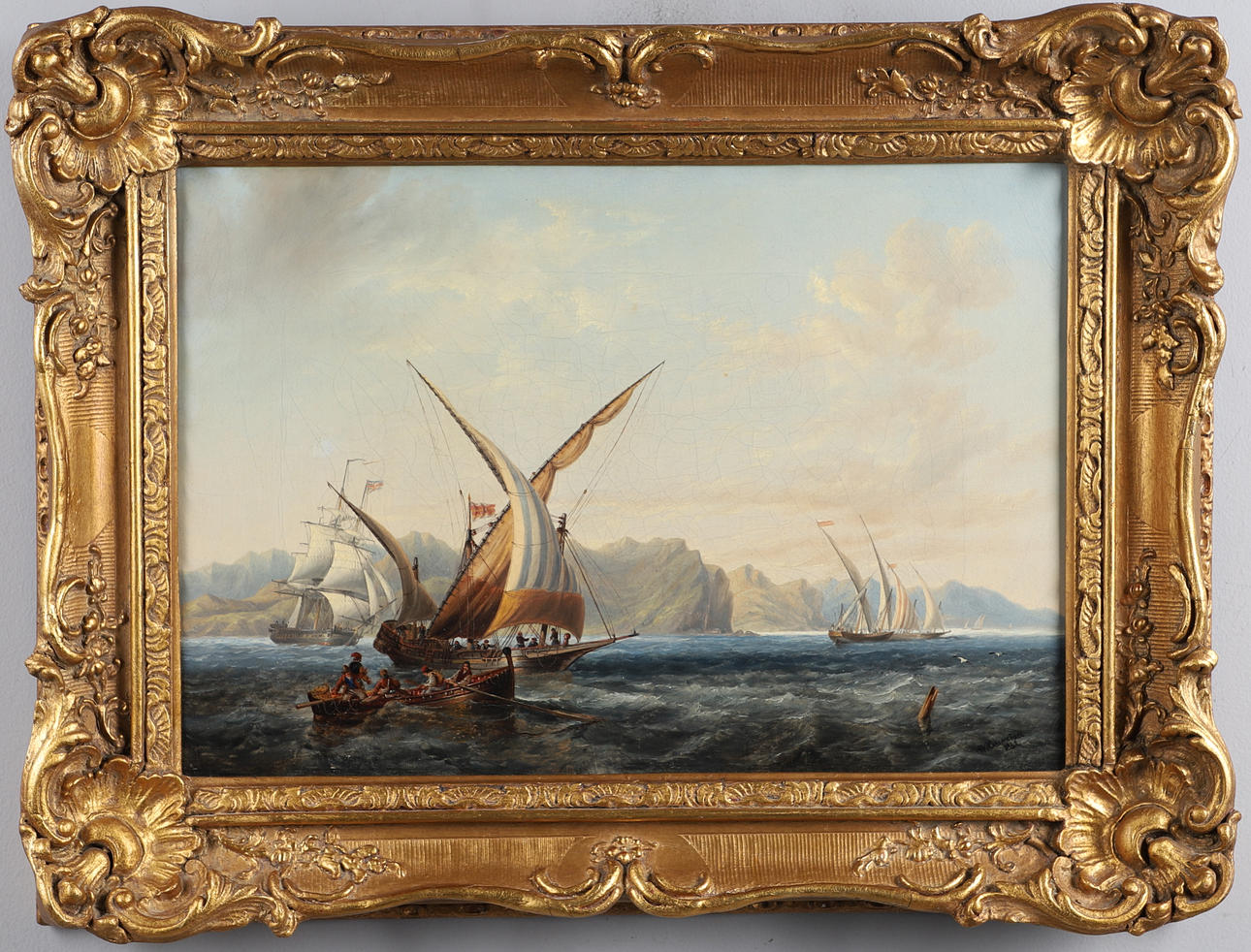 JOHN WILSON CARMICHAEL (1800-1862). SPANISH XEBECS AND FISHERMEN WITH A BRITISH FRIGATE OFF A MOUNTAINOUS COAST.