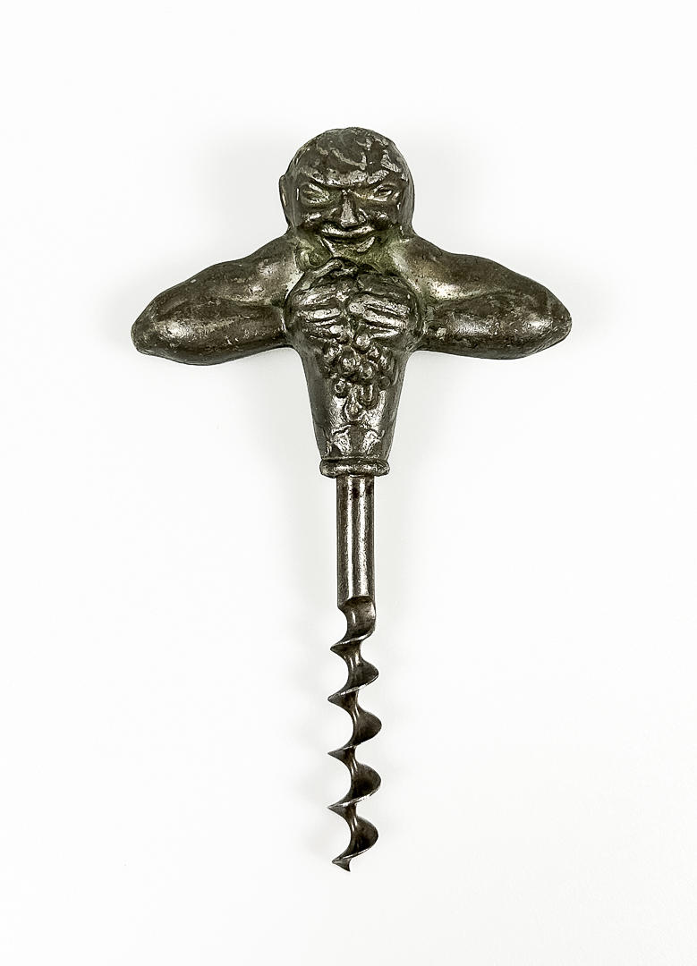 KORKSKRUV, tenn, "Guden Bacchus".
