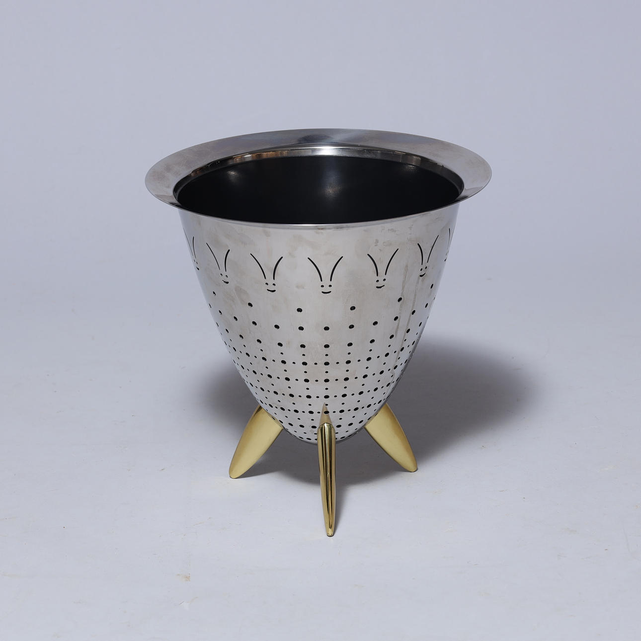 PHILIPPE STARCK (1949-). A champagne cooler, steel, brass and