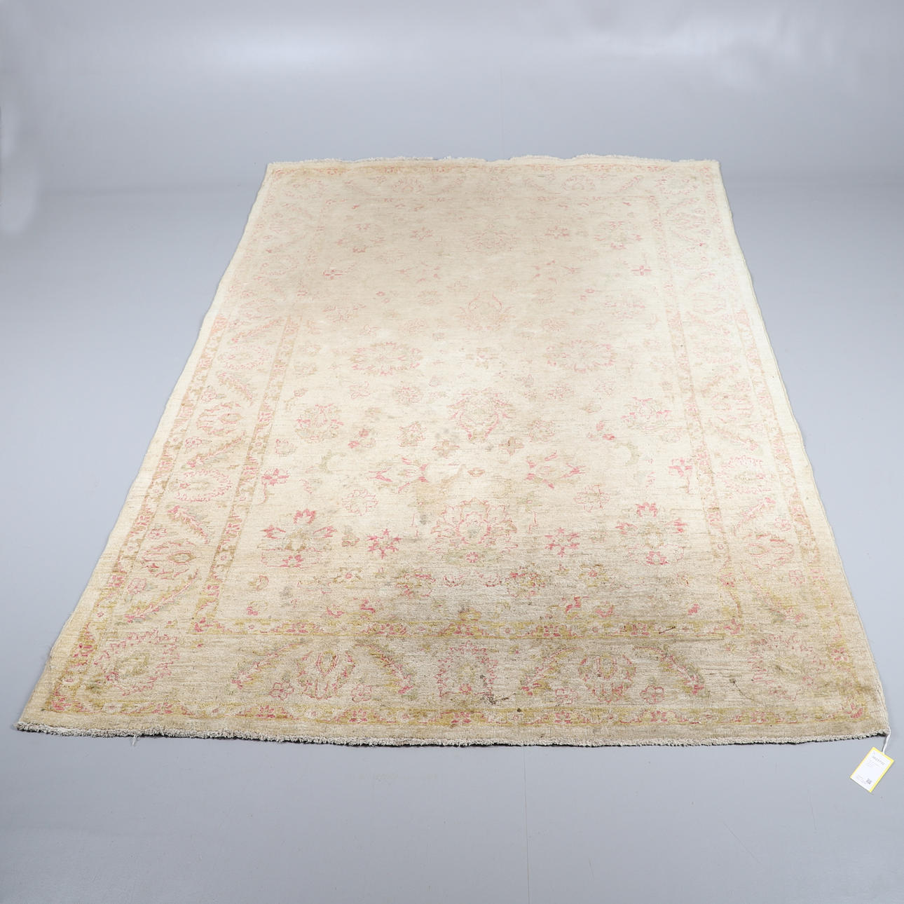 AN AFGHAN ZIEGLER DESIGN CARPET.