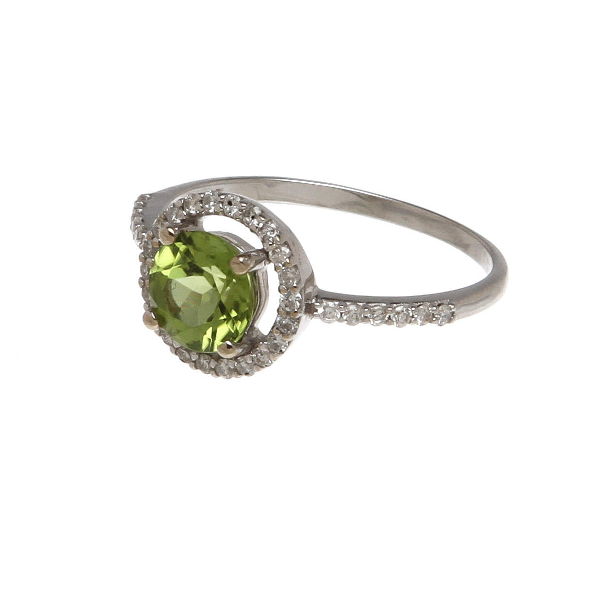 RING, 14K vitguld med peridot samt diamanter, totalt ca 0,17 ct. Vikt 1,9 g.