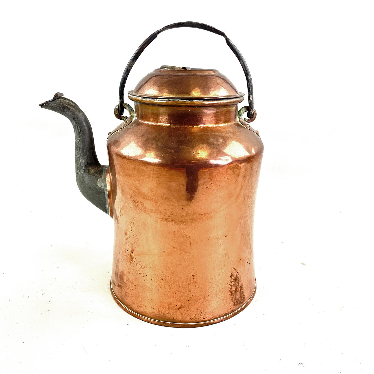 A 19th century copper coffee pot.