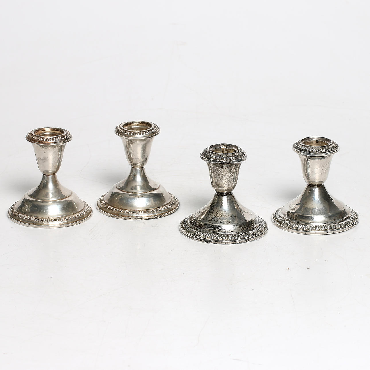 LJUSSTAKAR, två par, sterling silver, Gorham och Cmpire.