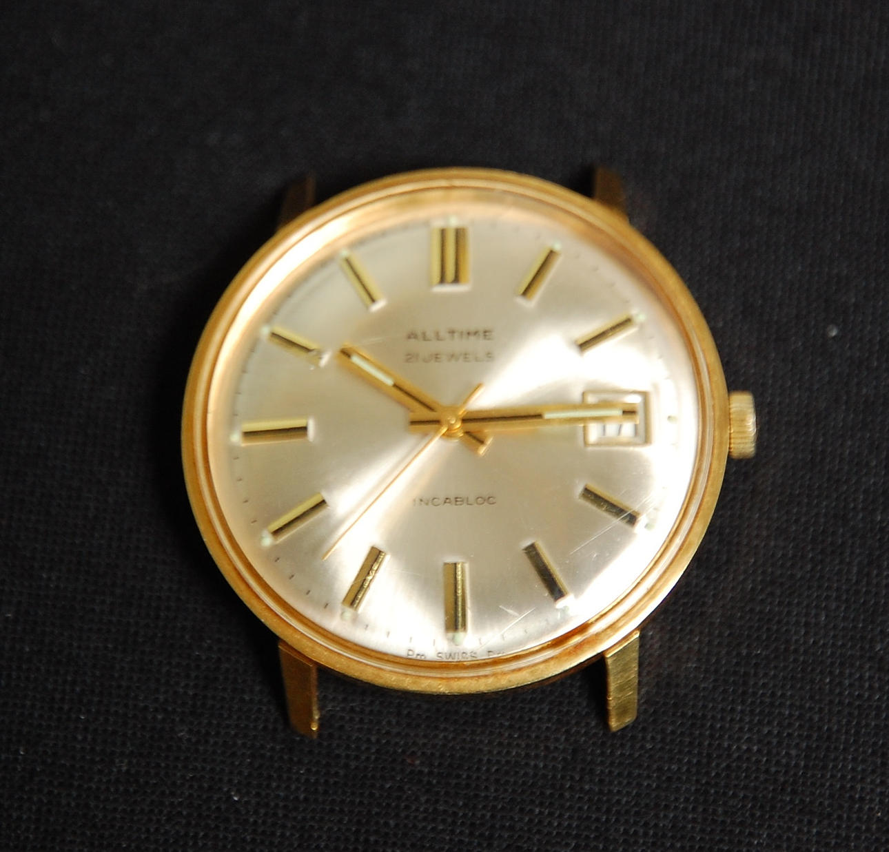 HERRARMBANDSUR, " All Time" 18 K guld.