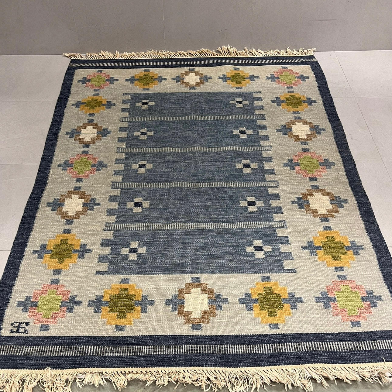 ELSA EKHOLM. Carpet, wicker, signed.