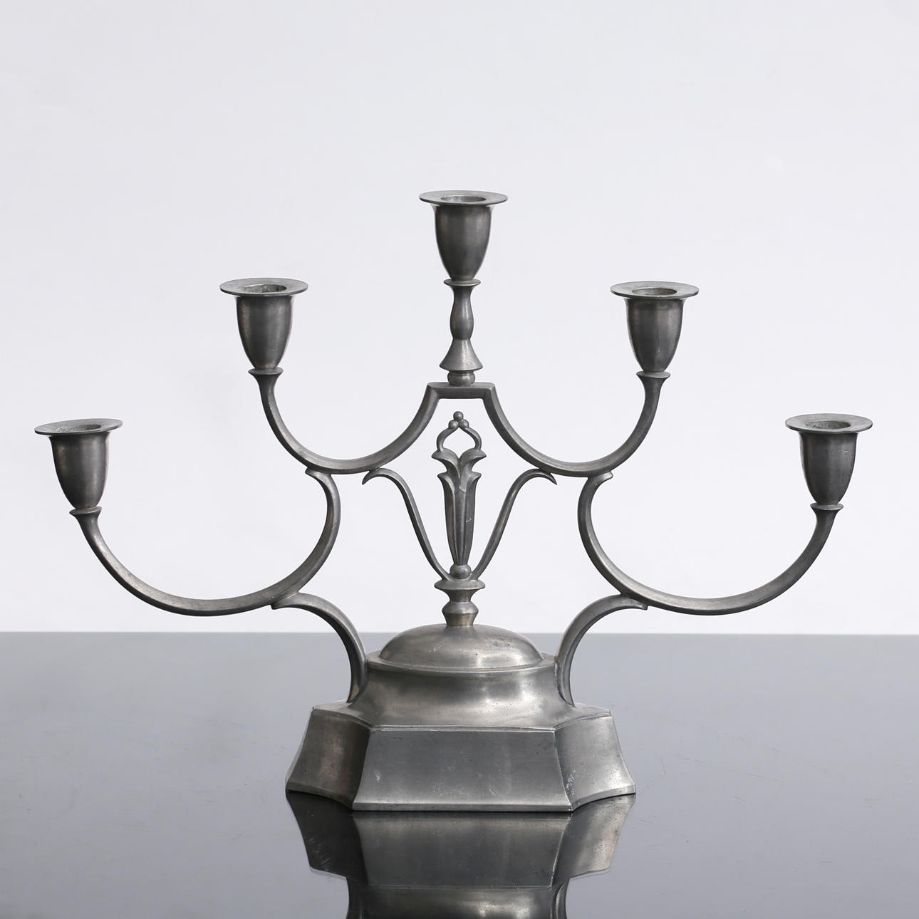 JUST ANDERSEN. (1884—1943). A tin candelabra, Denmark.