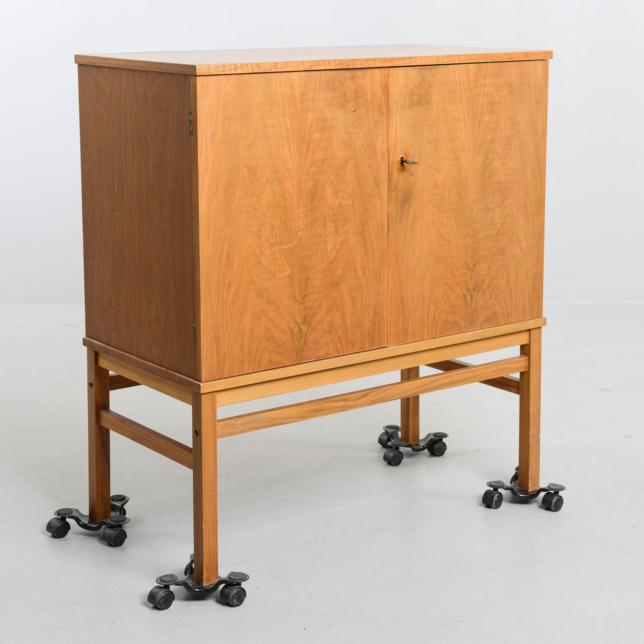A mid 20th century bar cabinet.