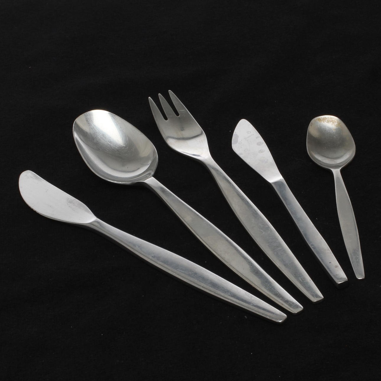 BESTICK, 27 delar. "Focus Steel", Folke Arström, Gense, 1900-talets andra hälft.