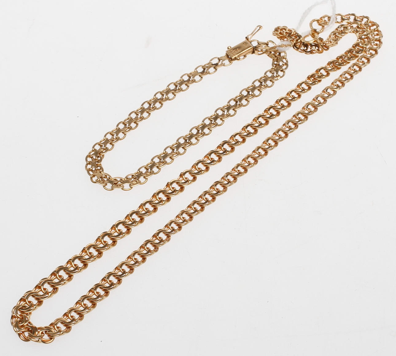 HALSBAND samt ARMBAND, 18k guld, vikt ca 38 gram.