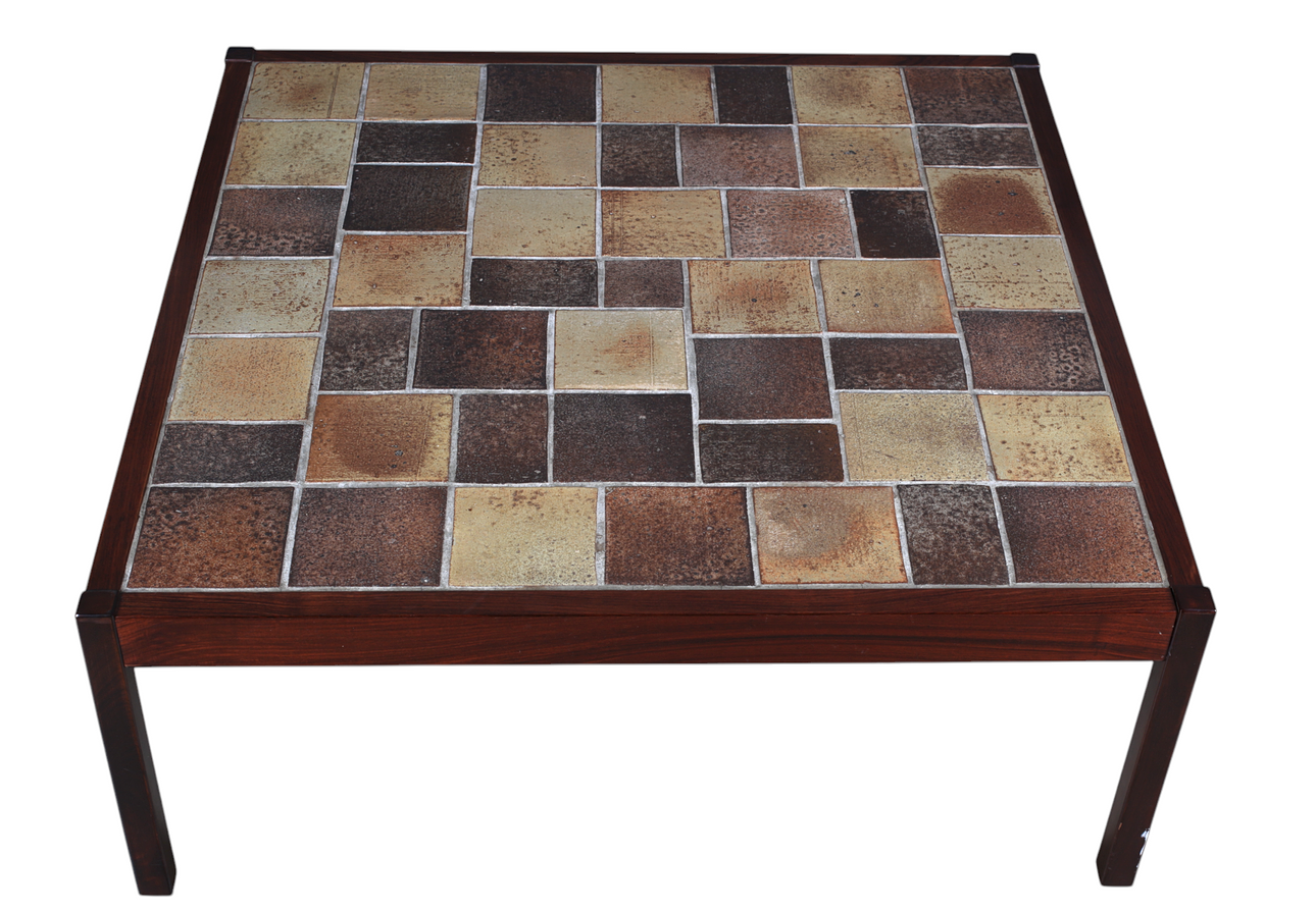 A 1970s-century wood/ceramic tile table.