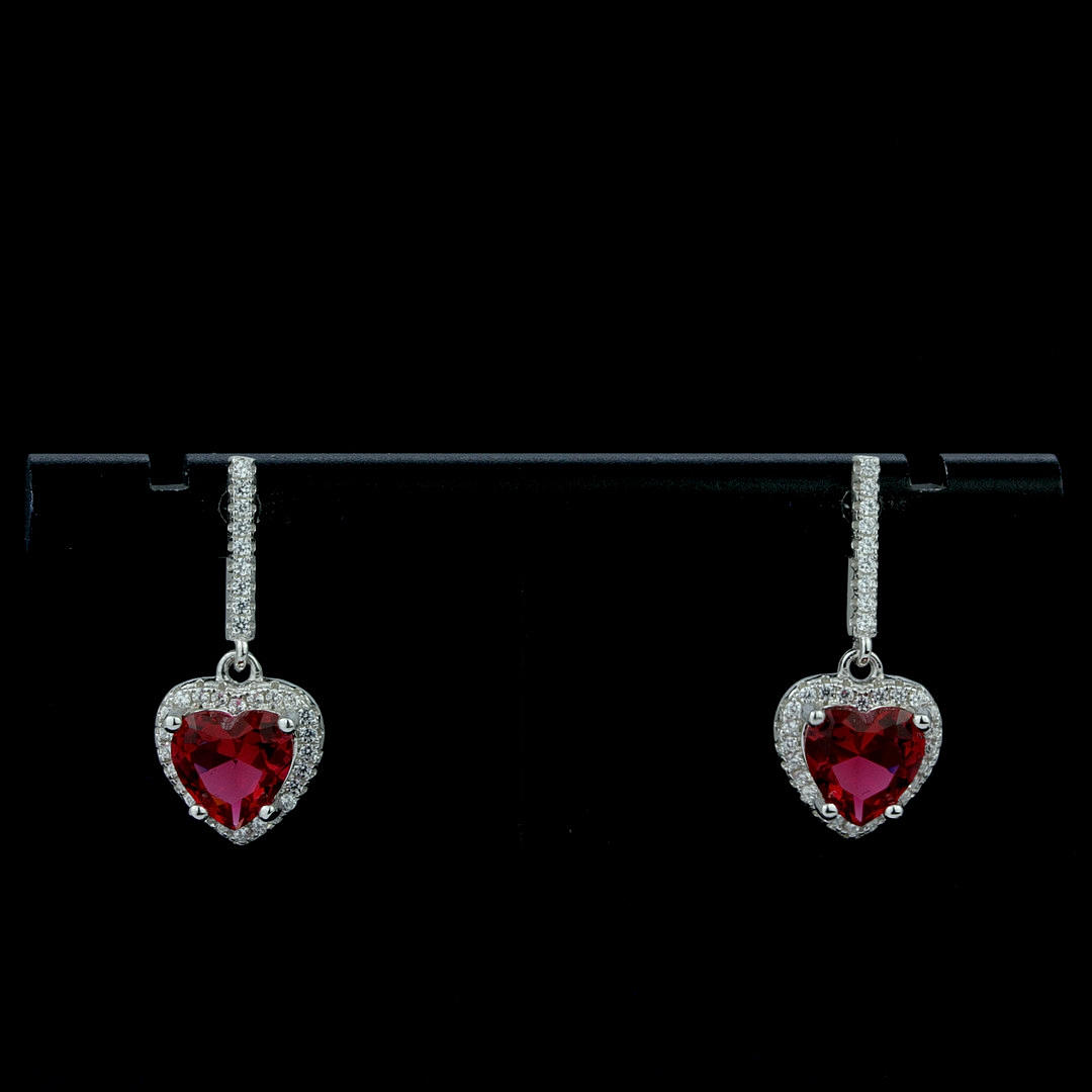 SILVER, WHITE AND RED STONE EARRINGS.