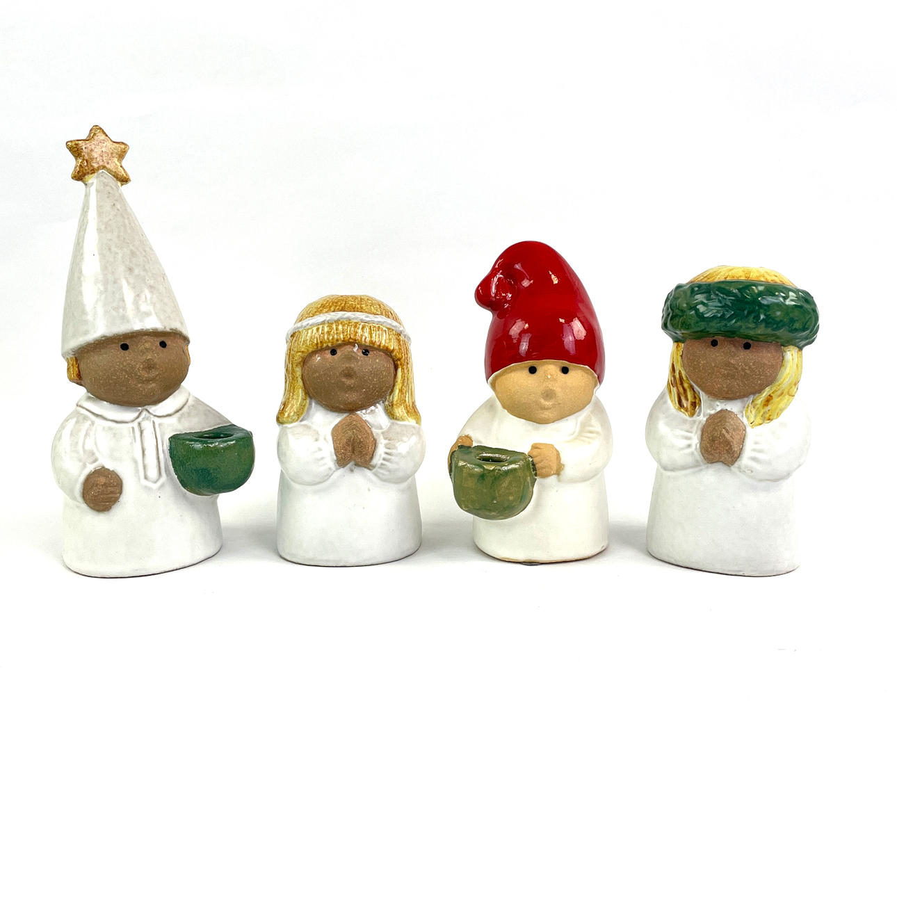LISA LARSON. Four stoneware figurines/candlesticks, “Adventsbarn