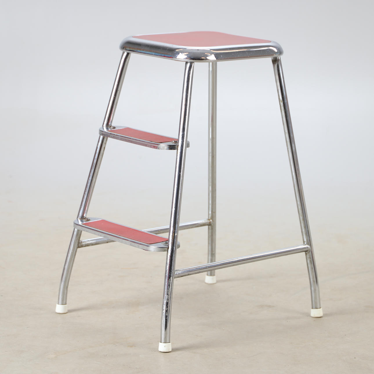 A metal step stool, AWAB, mid 20th century.