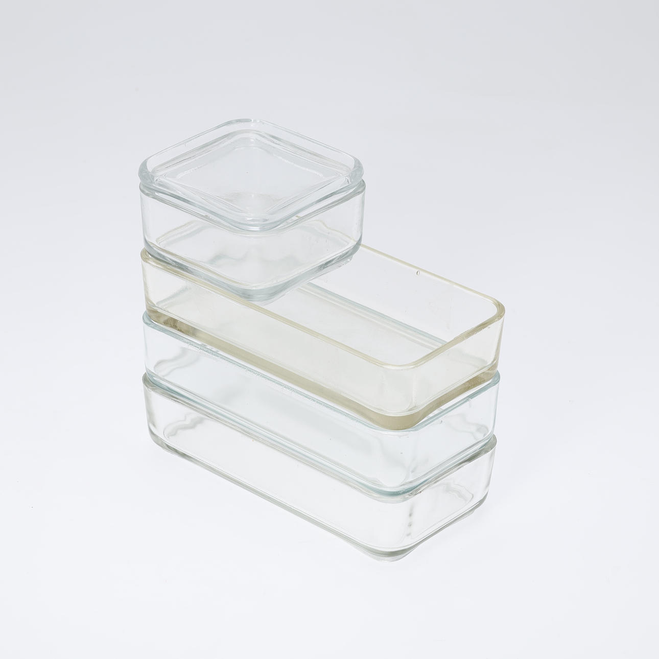 ATTRIBUTED TO WILHELM WAGENFELD (1900-1990). Glass storage frame