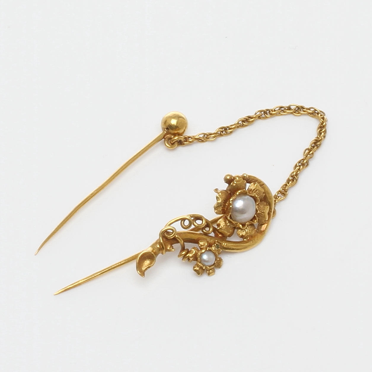 KRAVATTNÅL, 18k guld, otydliga stämplar, 1885.