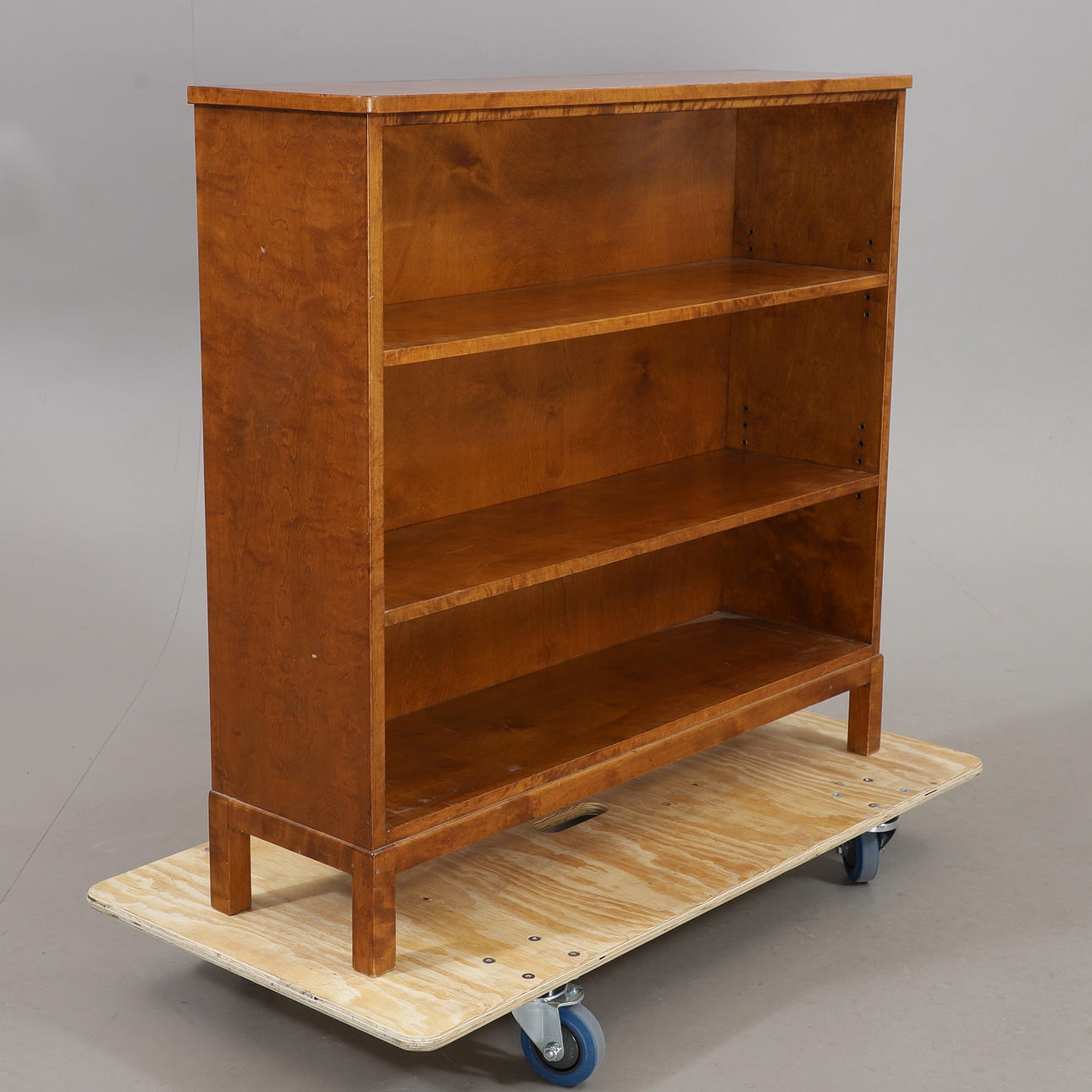 A 1940s birch bookcase.