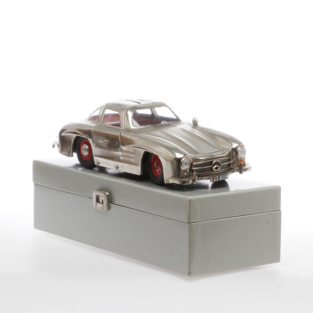 MÄRKLIN 1992 Mercedes plåtbil i originalkartong. Urverk.