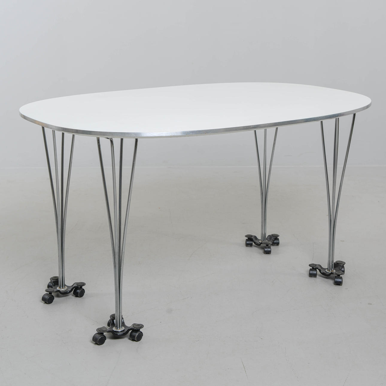 BRUNO MATHSSON & PIET HEIN. Table, “Superellips”, Fritz Hansen, Denmark, dated 1987.