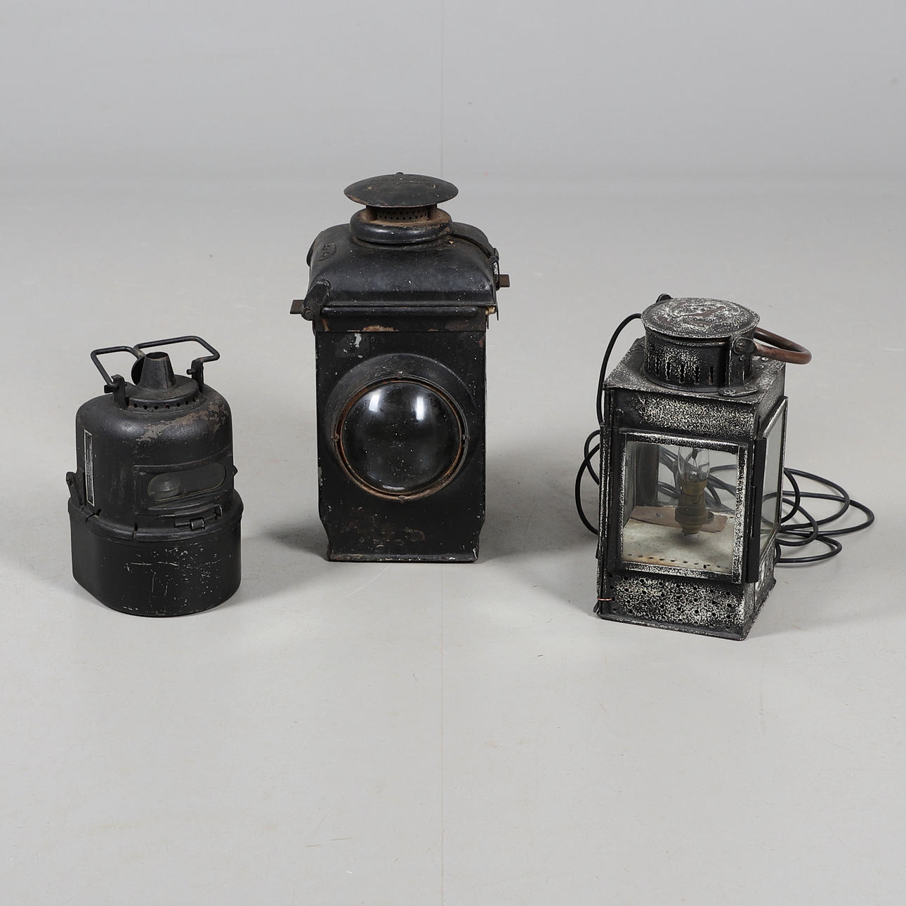 THREE RAILWAY LANTERNS.