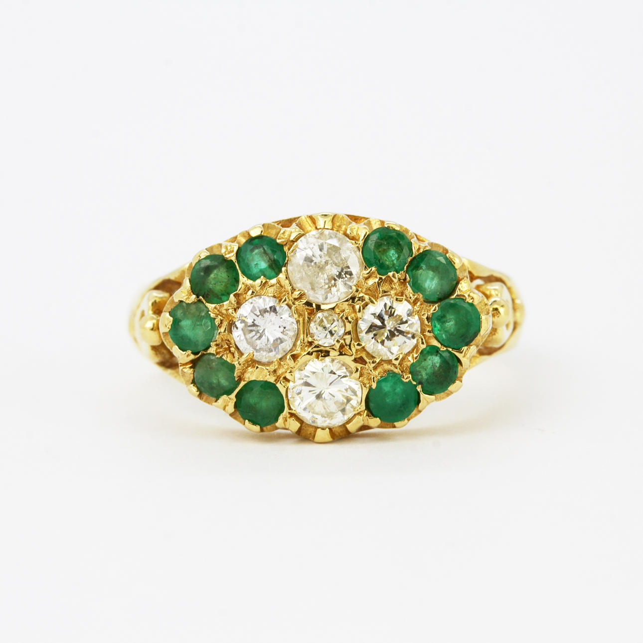18CT YELLOW GOLD,EMERALD AND DIAMOND SET RING.