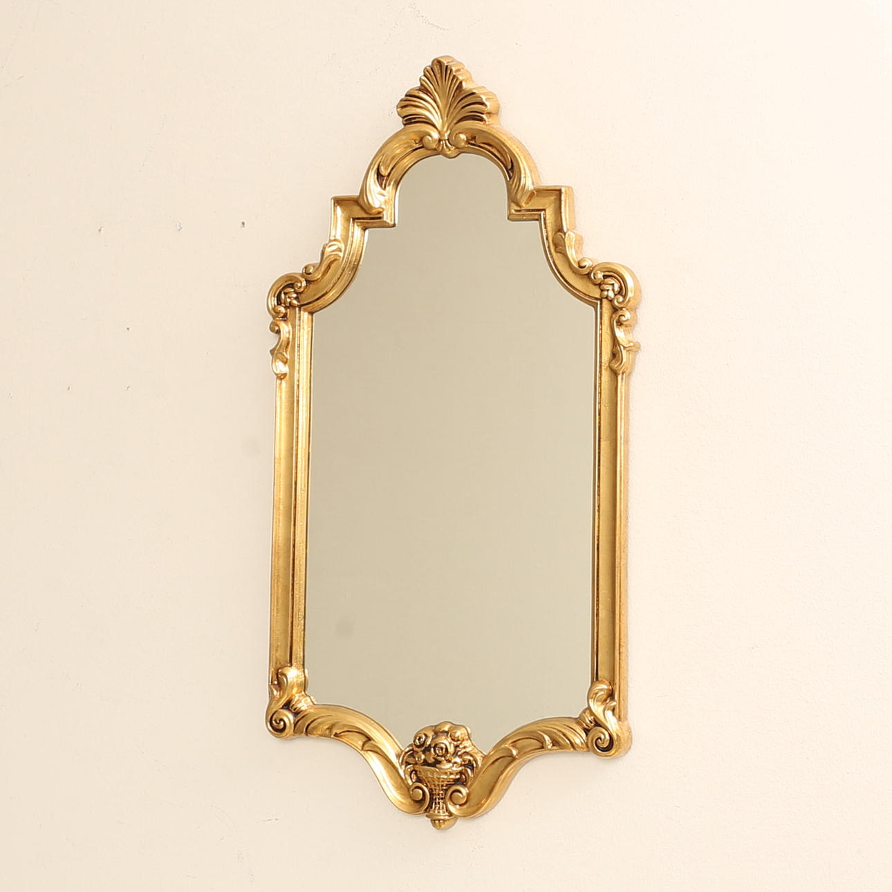 A 20th century bronze mirror.