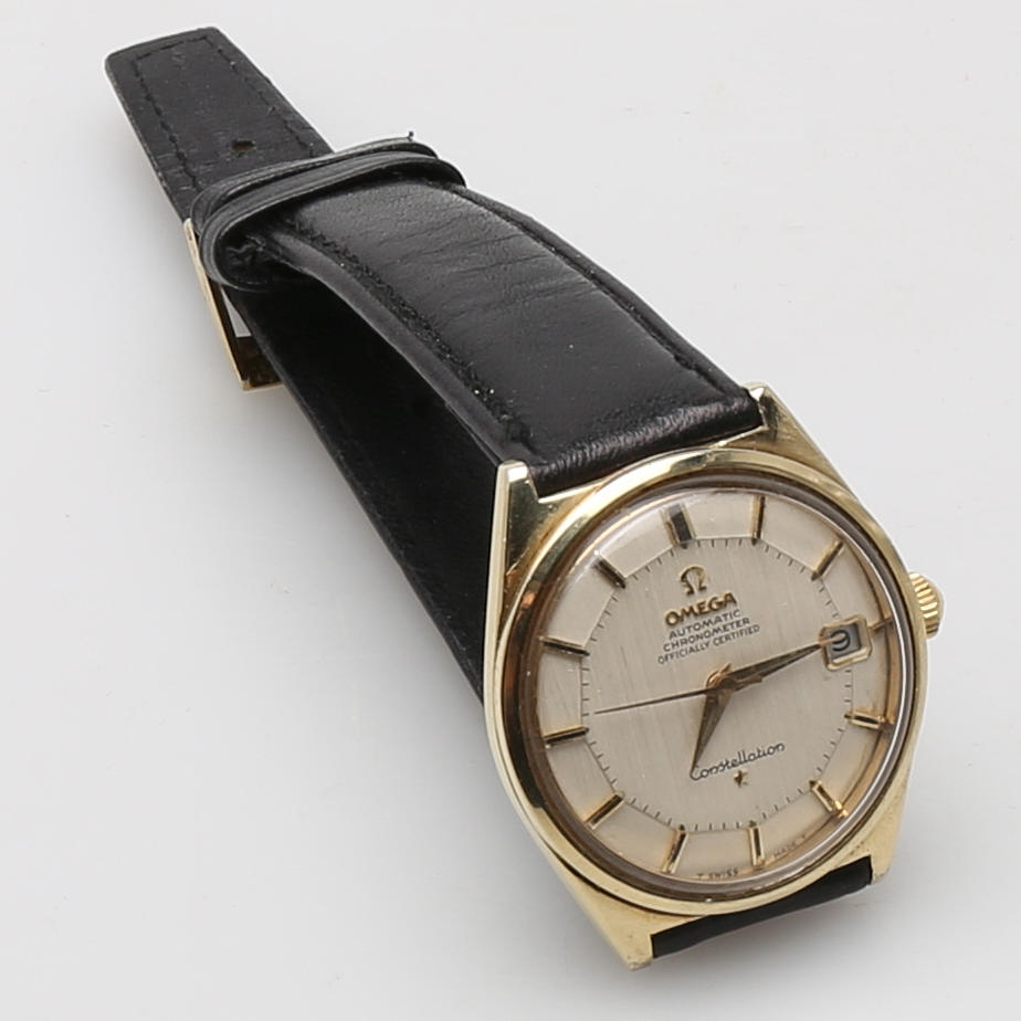 HERRARMBANDSUR, Omega, Constellation, 1960-tal, guld på stål.