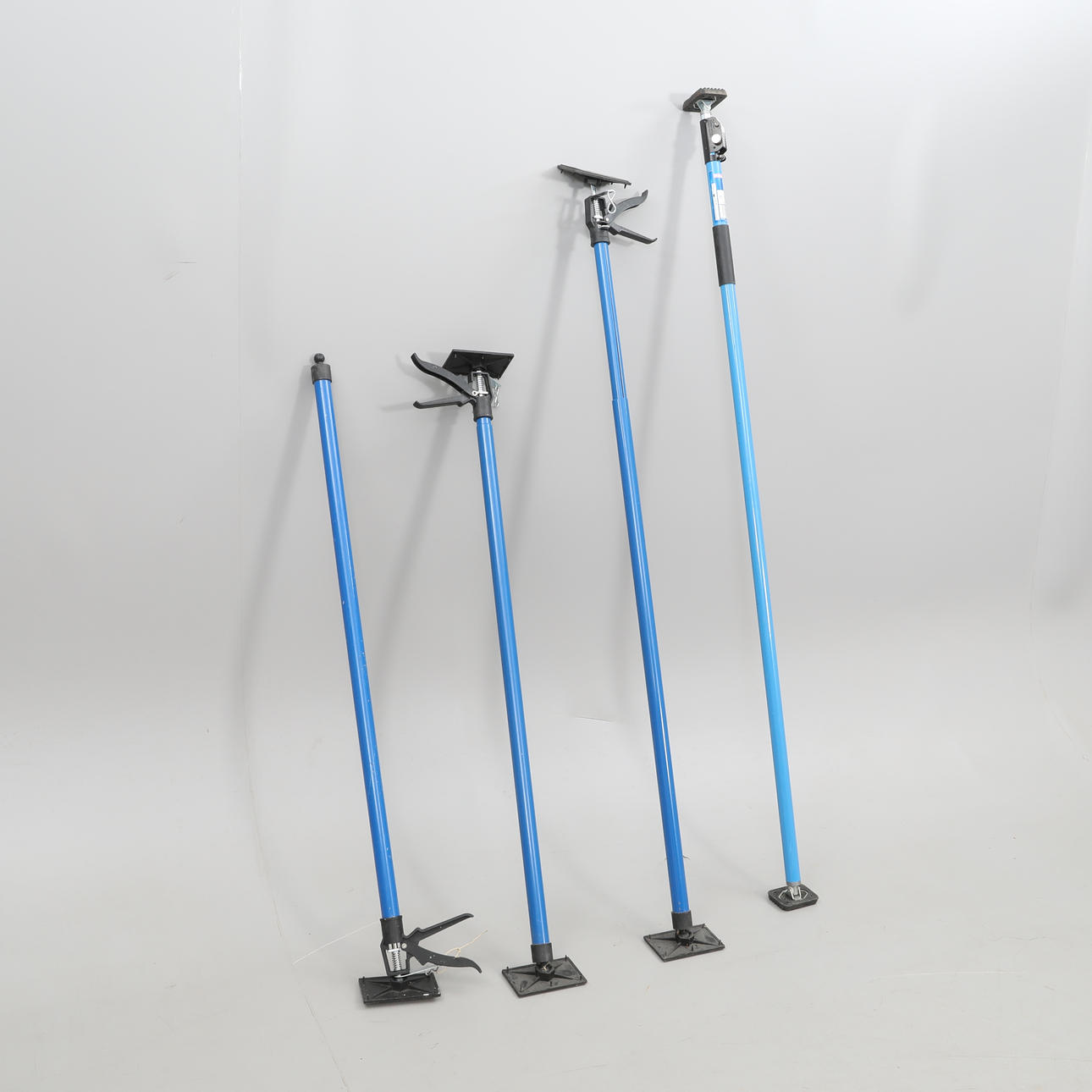 TELESCOPIC STRUTS, four pieces.