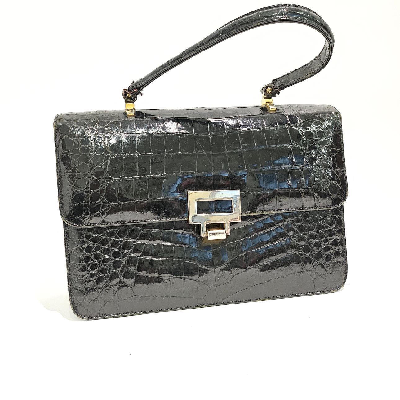 HÅNDTASKE I SORT KROKODILLE LÆDER.