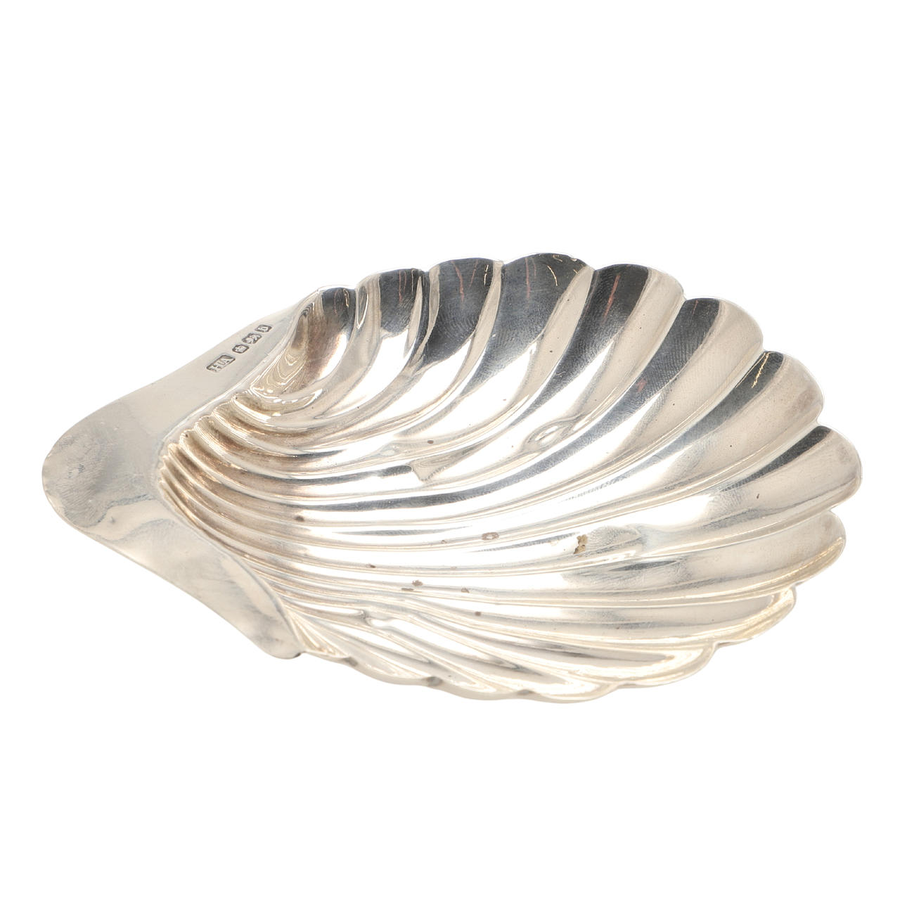 A LATE VICTORIAN SILVER SHELL BUTTER DISH.