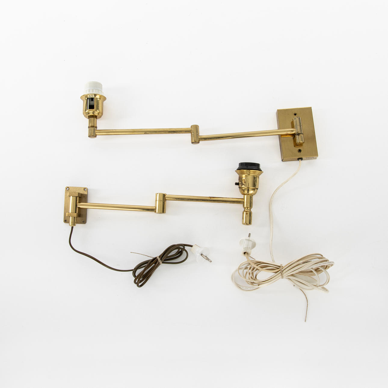 Two brass wall lamps, late 20th century.