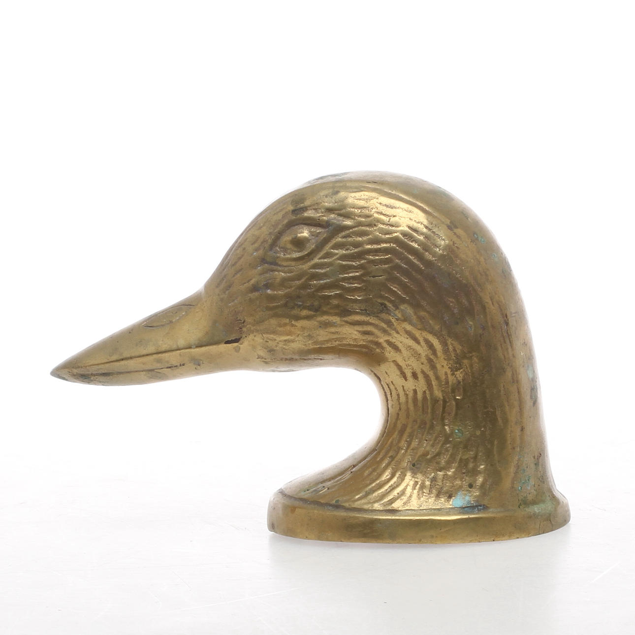 KAPSYLÖPPNARE i form av andhuvud, mässing, 1900-talets andra hälft.