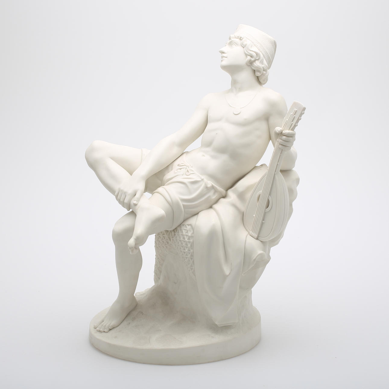 FIGURIN, musikant, parian, Gustavsberg, 1898.