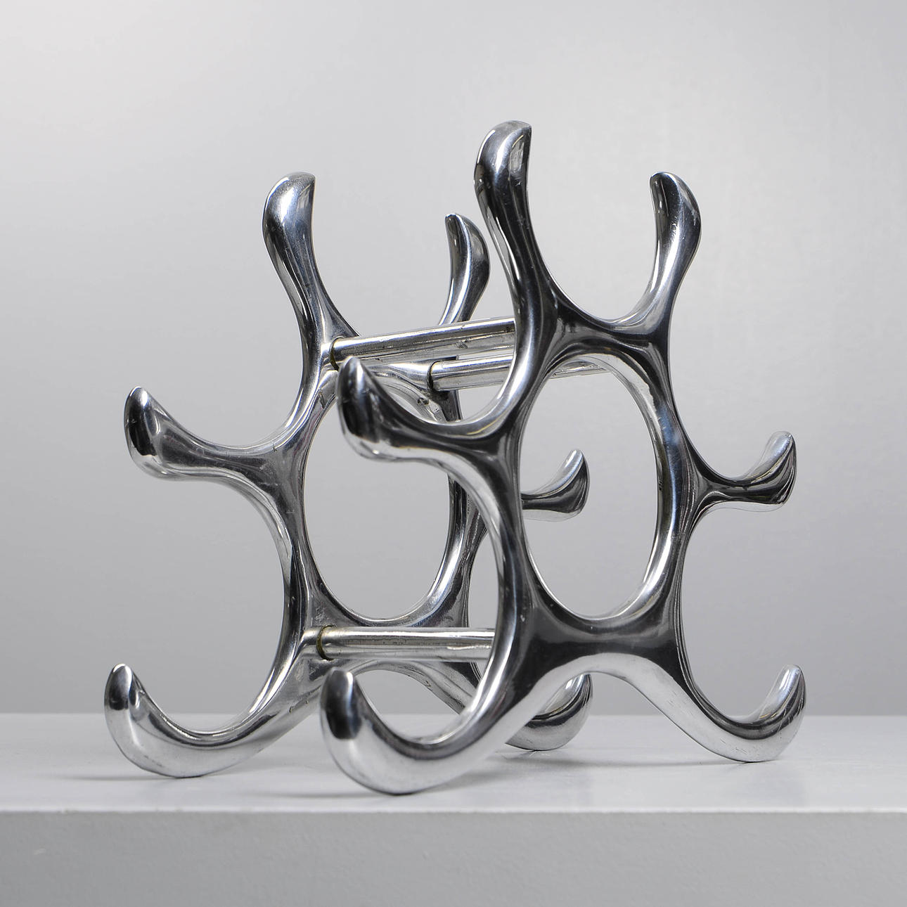 MICHAEL NOLL. A wine rack, aluminium, Eichholtz, 2000s. Silver