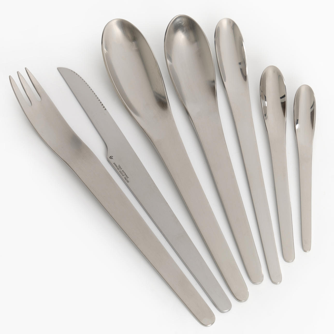 ARNE JACOBSEN “AJ cutlery”, 65 pieces, for Georg Jensen, Denmark
