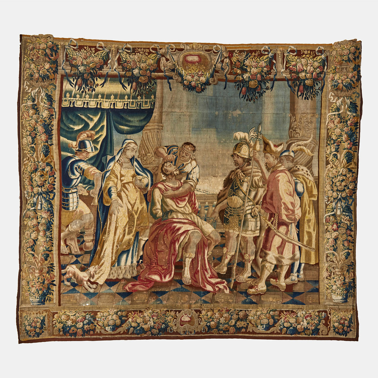 A FLEMISH TAPESTRY from 17th century, figure scene with Samson and Delila, border with floral festoons, flower garlands and bouquets, polychrome, tapestry technique in wool with highlights in silk.