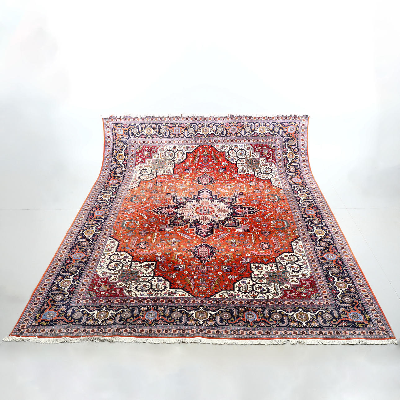 An oriental rug. Tabritz, 392x298 cm.