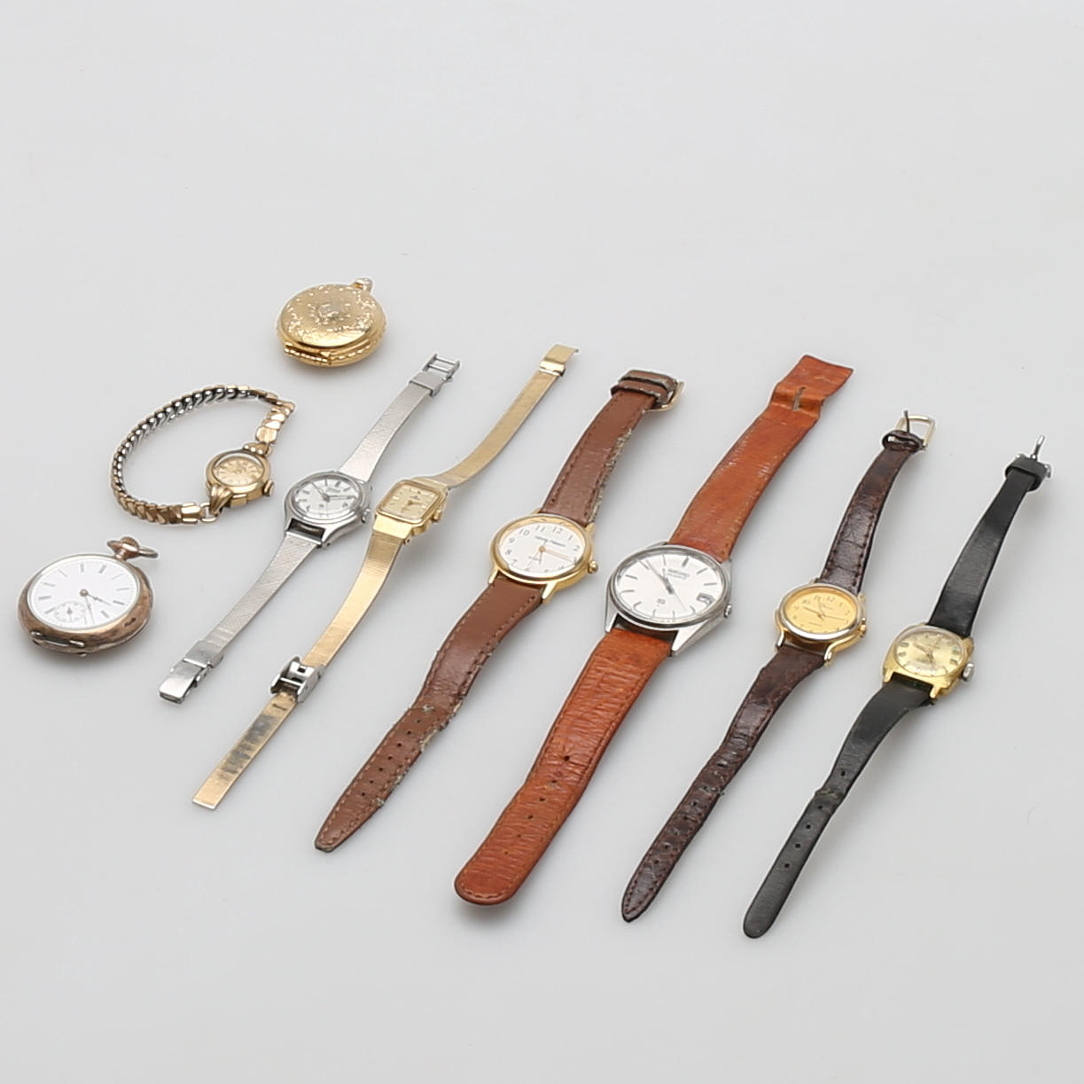 7 wristwatches, 1 pocket watch, silver.