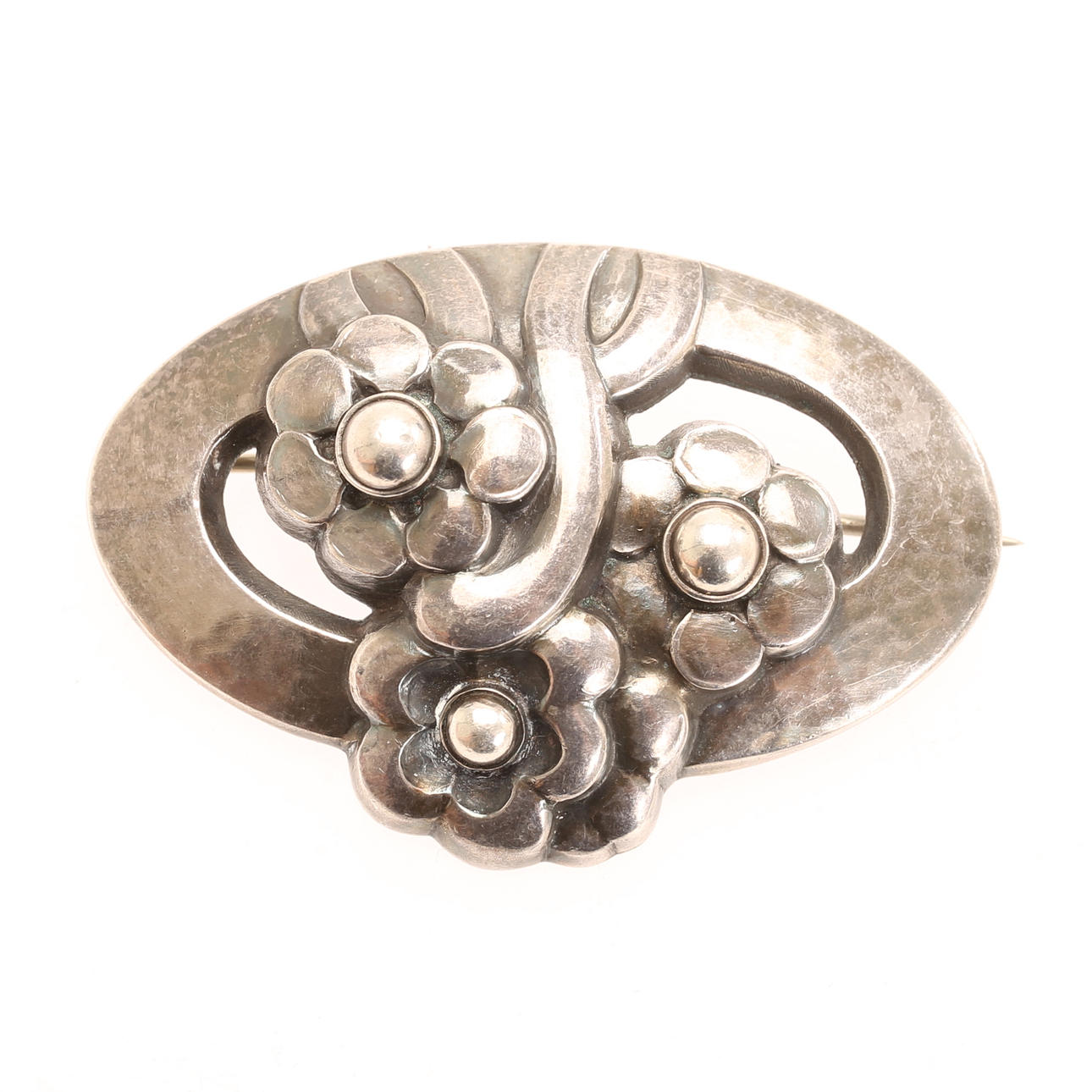 GEORG JENSEN. A model 28 sterling silver brooch, Denmark.