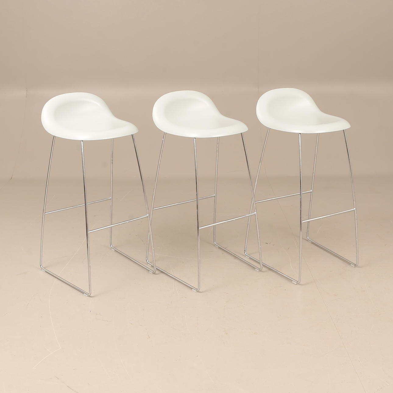 A set of 3 bar stools, “3 D Bar Chair”, Gubi.