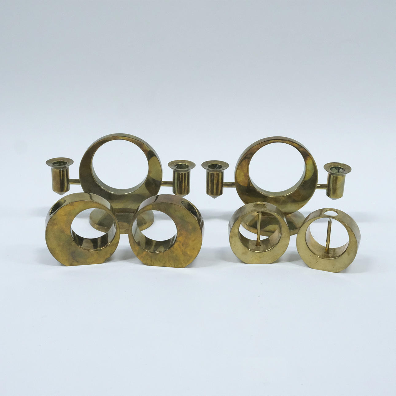 SIX CANDLESTICKS, ARTHUR PE, CHARCOAL STREAM, BRASS.