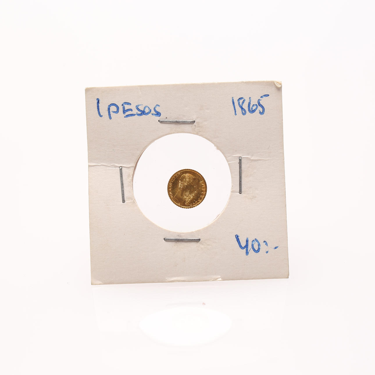 A Mexican peso coin, 1865, gold.