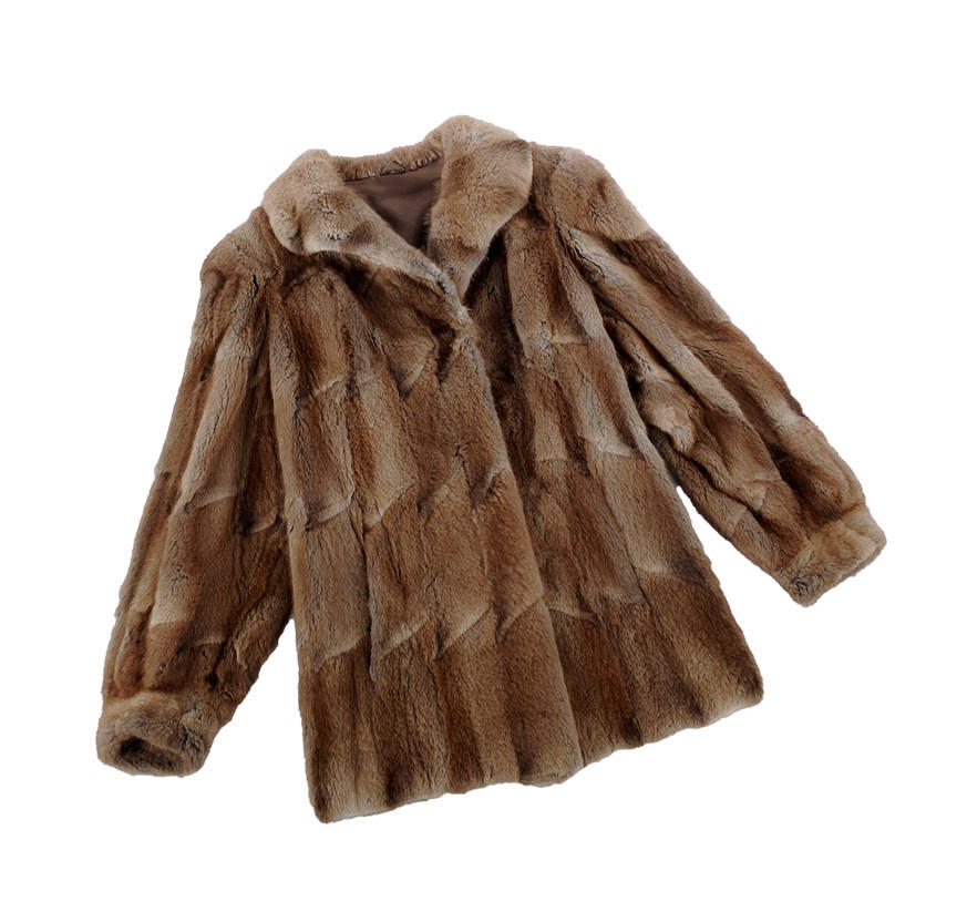 PELZJACKE. -tätningen.