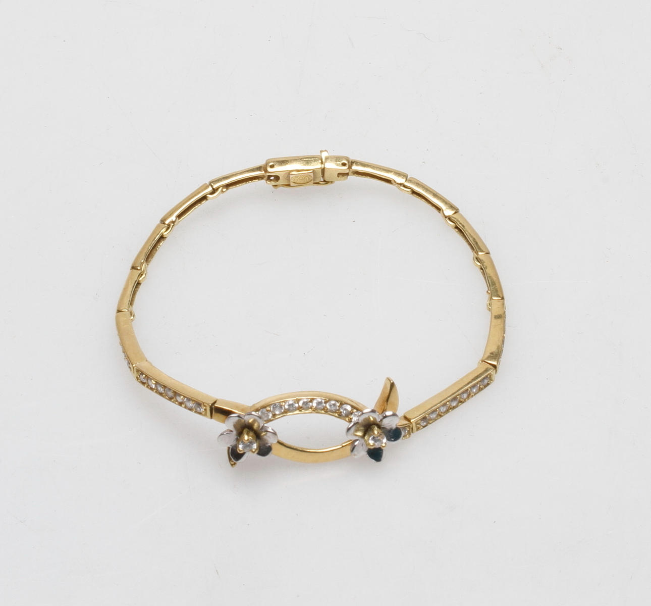 ARMBAND MED STENAR, 18k guld, vikt ca 12,4 gr.