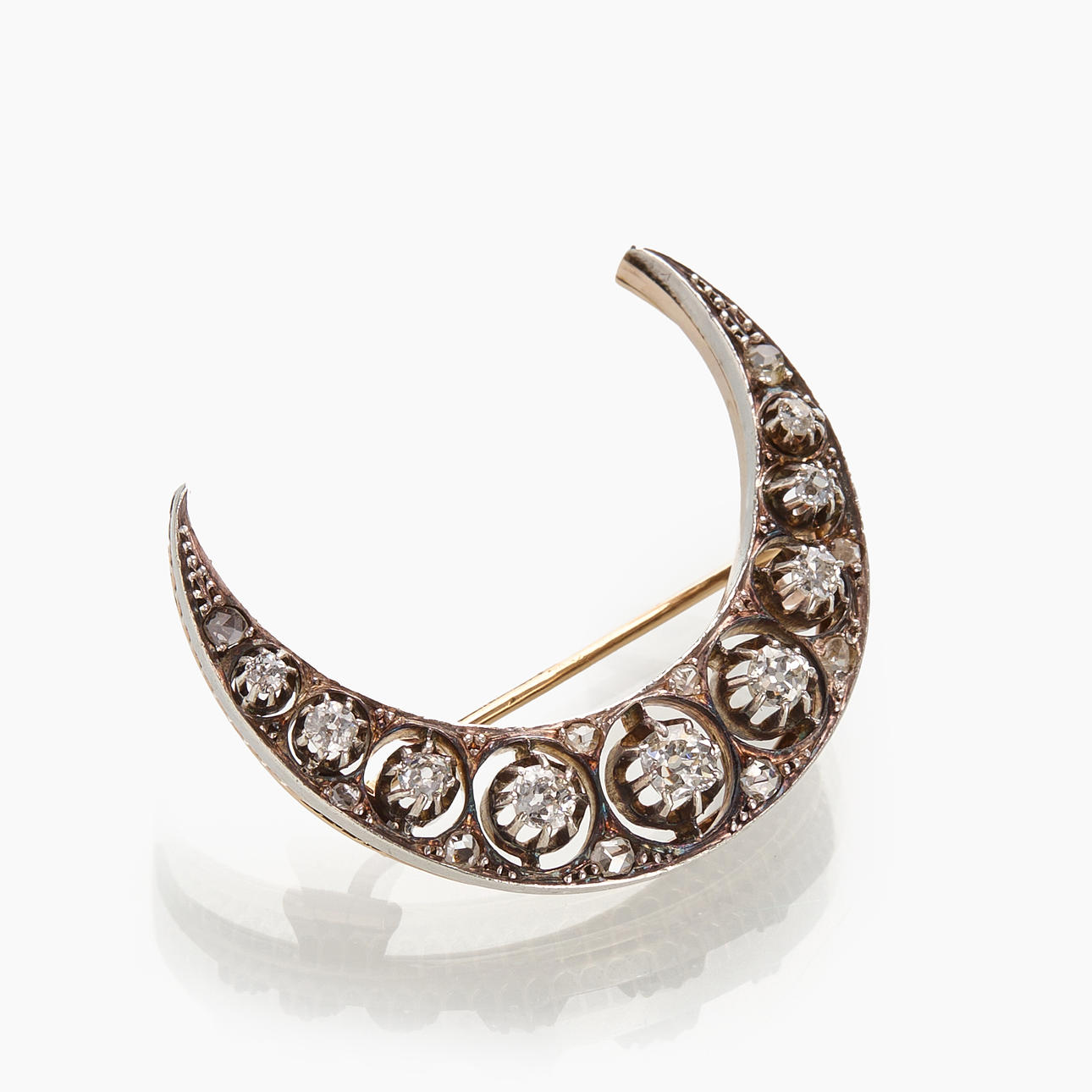 Brooch, 18K gold and silver, shape of a mooncut decorated with 19 old ...