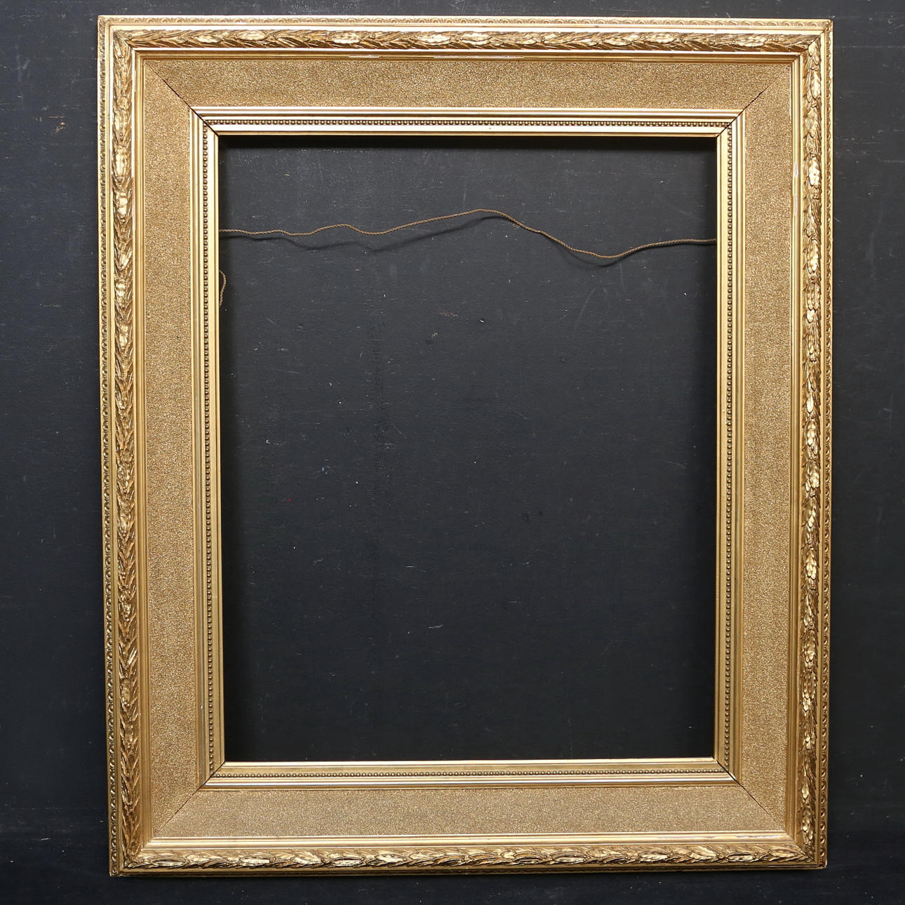 An 1890s pastel framed picture frame.