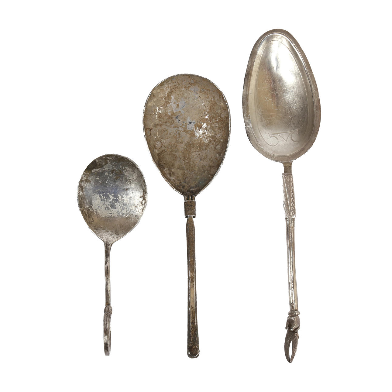 THREE INTERESTING WHITE METAL SPOONS (3).