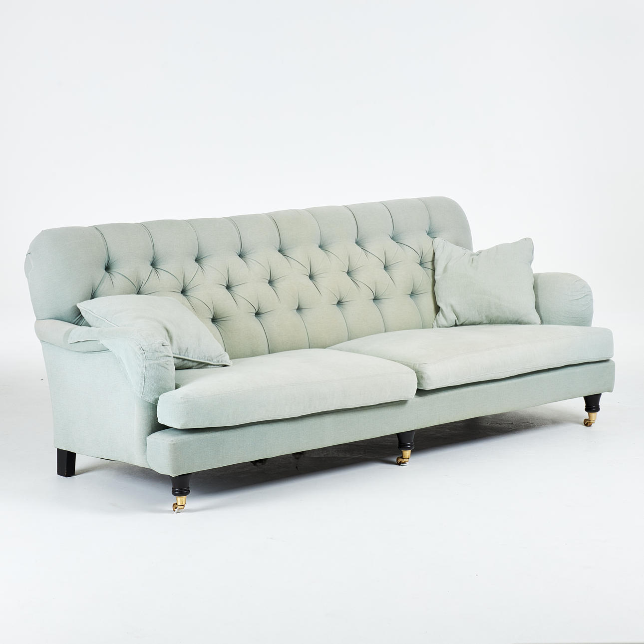 SOFA, Howard model, Englesson, deep stitched back, loose seat cushions with removable textile upholstery, on cardigans, marked.