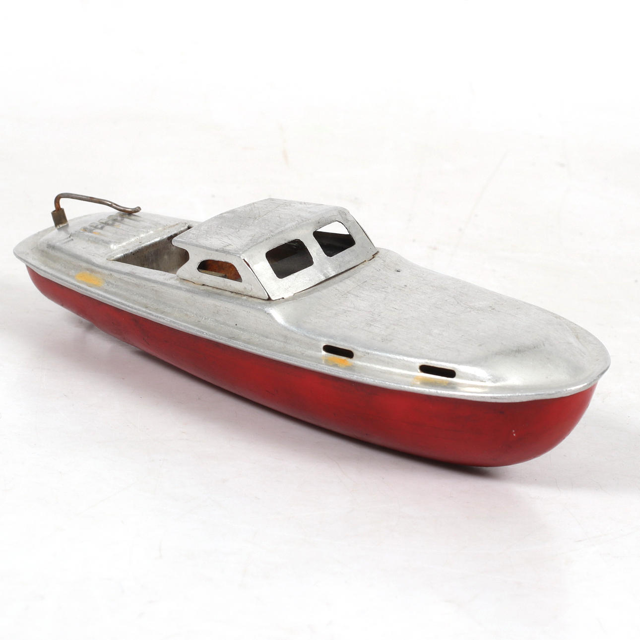 A mid 20th century metal model boat.