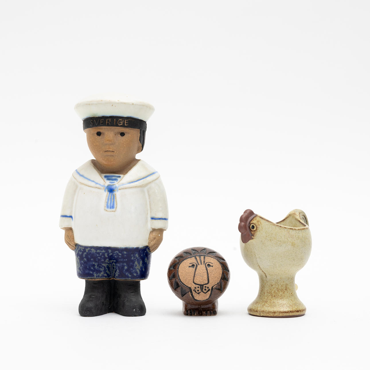 LISA LARSON. Figurines, 2 pieces and egg cup, stoneware, Gustavsberg.